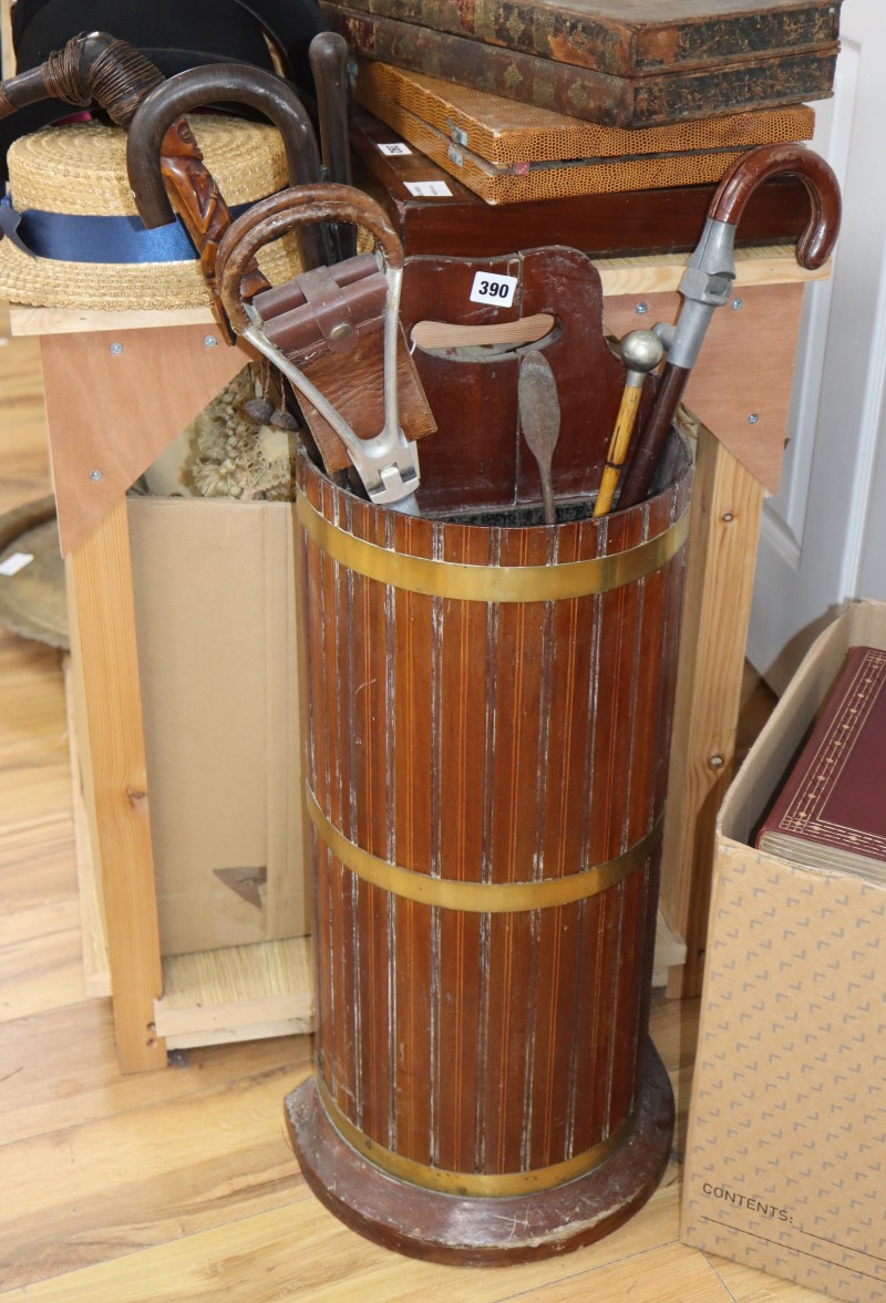 A brass bound stick stand and sticks